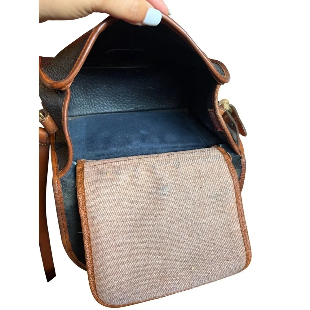 Dooney & Bourke All Weather Leather Vintage Navy‎  Crossbody Bag Brass Duck Fob